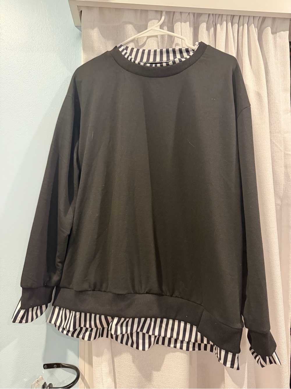 Amazon Black Crewneck Sweater with Black-and-White Striped Hem